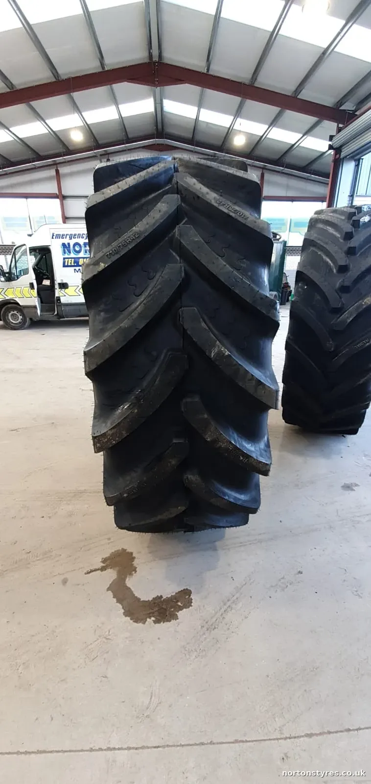 Large tractor tyres standing in the Nortons Tyres workshop Large tractor tyres standing in the Nortons Tyres workshop