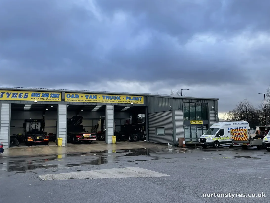Nortons Tyres car, van, truck and plant bays in Miles Platting, close view Nortons Tyres car, van, truck and plant bays in Miles Platting, close view
