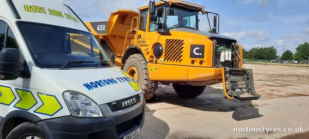 Nortons Tyres van attending an articulated dumper Nortons Tyres van attending an articulated dumper