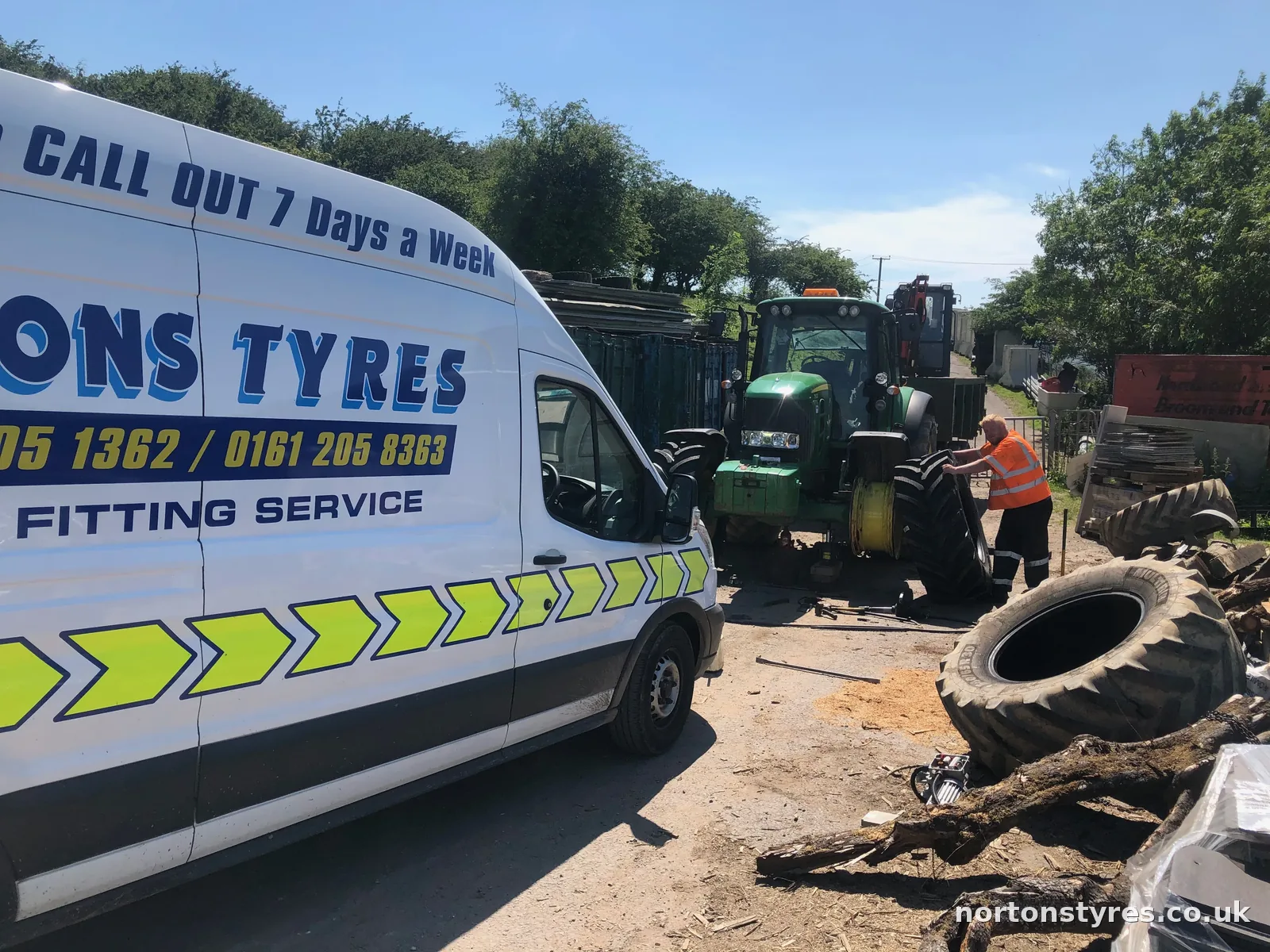 Nortons Tyres van beside a tractor on a farm call-out Nortons Tyres van beside a tractor on a farm call-out