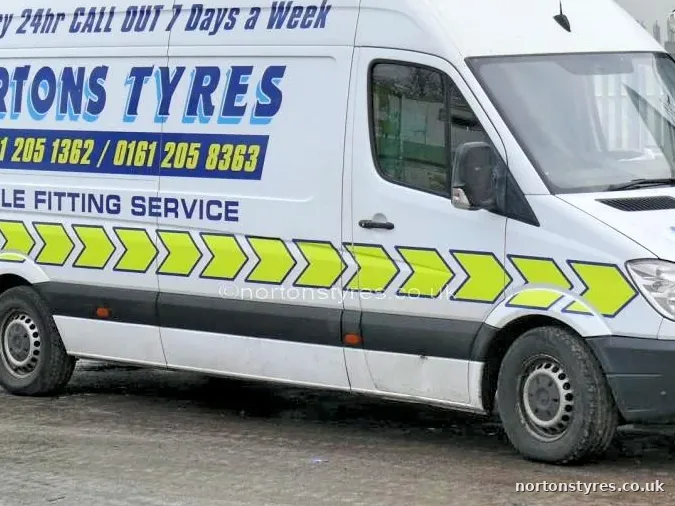 Nortons Tyres mobile fitting van in the yard, detail Nortons Tyres mobile fitting van in the yard, detail