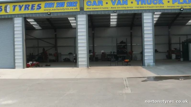 Open bays at the Nortons Tyres building, close view Open bays at the Nortons Tyres building, close view