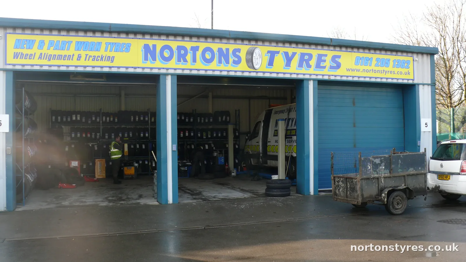 Nortons Tyres car bays on a wet day Nortons Tyres car bays on a wet day