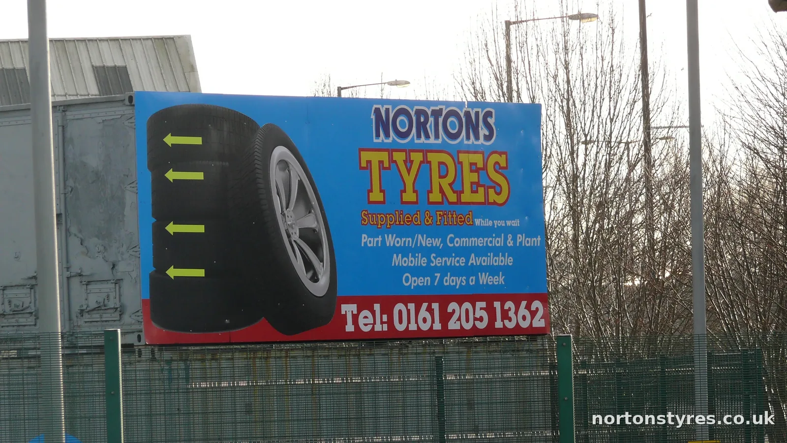 Nortons Tyres sign by the roadside Nortons Tyres sign by the roadside