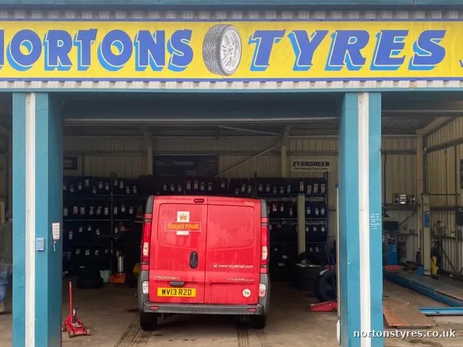 Red van in the Nortons Tyres bay, detail Red van in the Nortons Tyres bay, detail