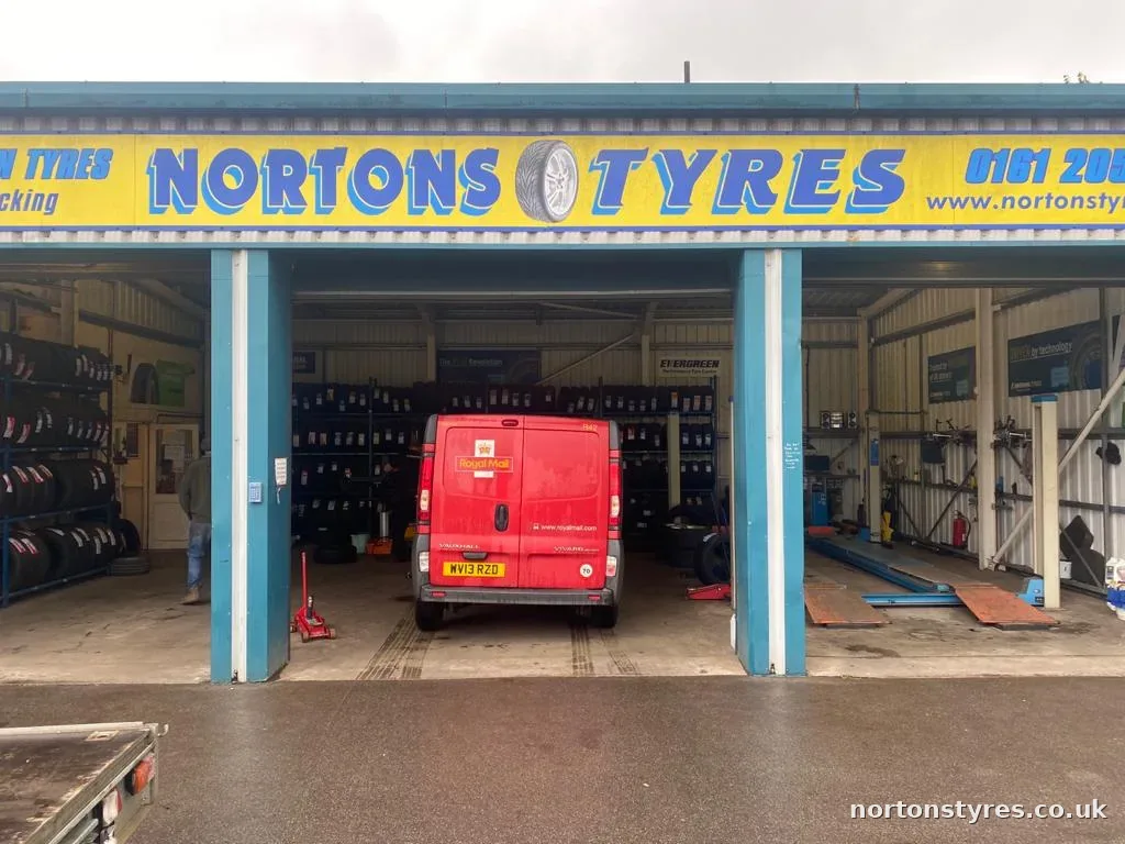 Red van in the Nortons Tyres bay Red van in the Nortons Tyres bay